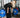 Kvinde der træner med blå StrapIt lifting straps fra MakeIt for bedre træning.