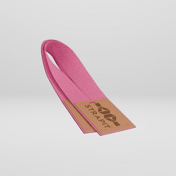 StrapIt Lifting Straps i pink fra MakeIt på lysegrå baggrund